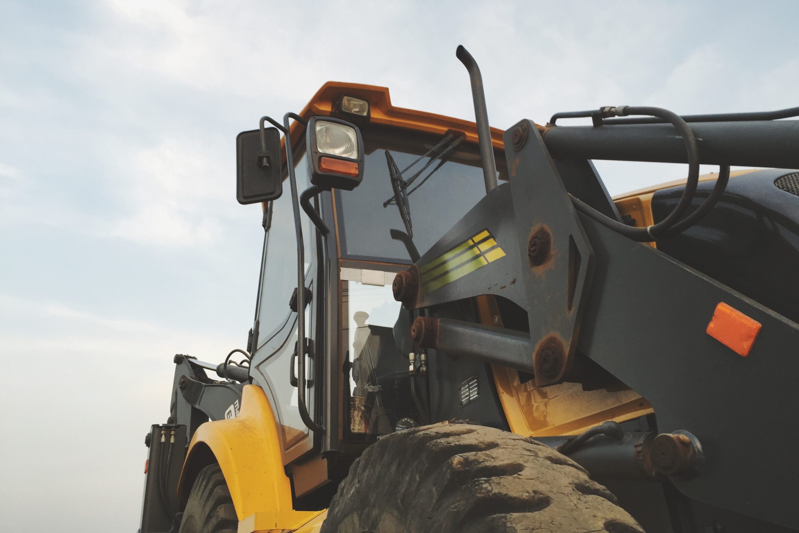 Septic Design company picture of backhoe